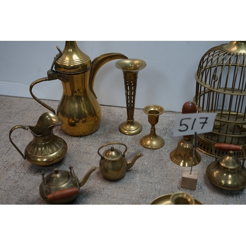 517 - An interesting shelf of copper and brass items