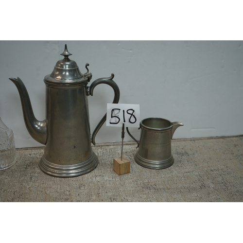 518 - A Pewter Coffee Pot, Milk Jug and Sugar Bowl plus a Cut Glass Bottle