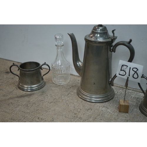 518 - A Pewter Coffee Pot, Milk Jug and Sugar Bowl plus a Cut Glass Bottle