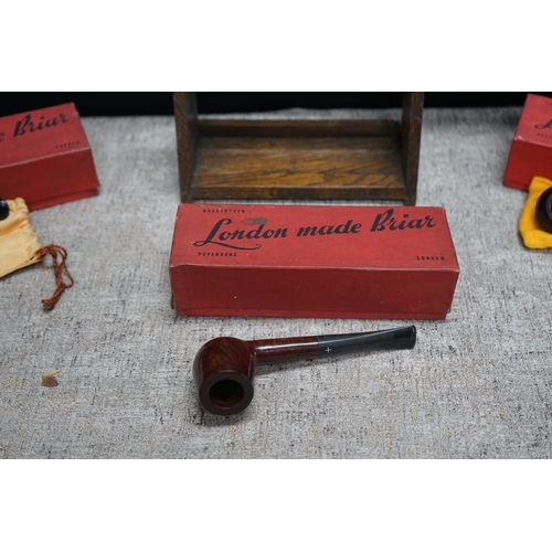 222 - Unused Old Stock- 3 Boxed and Packaged Civic Tobacco Pipes and a Wooden Pipe Rack