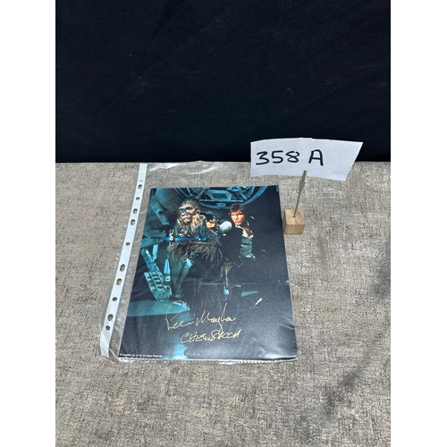 358a - Star Wars Interest: A Peter Mayhew autographed Photograph of Chewbacca & Han Solo