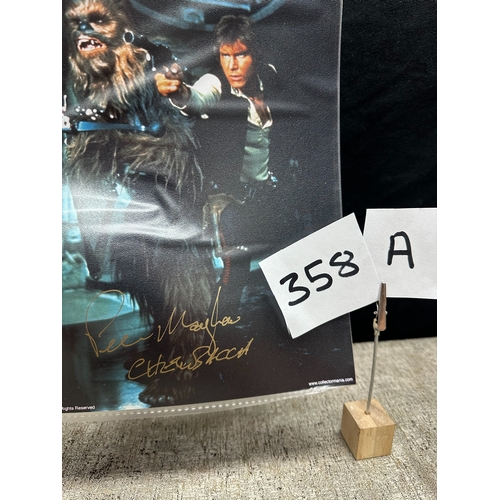 358a - Star Wars Interest: A Peter Mayhew autographed Photograph of Chewbacca & Han Solo