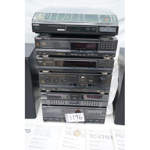 1196 - Collection of Sony stereo components, including two speakers, a turntable, multiple audio units, rem... 