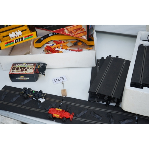 143 - Collection of Scalextric racing sets including 