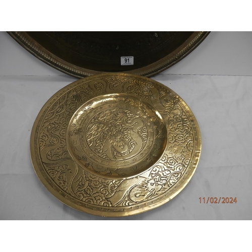 138 - Pair of Large Brass Chargers (largest 65cm)