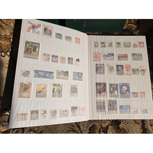 99 - 3x good albums of world stamps - small example of pages shown