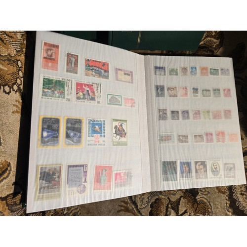 99 - 3x good albums of world stamps - small example of pages shown