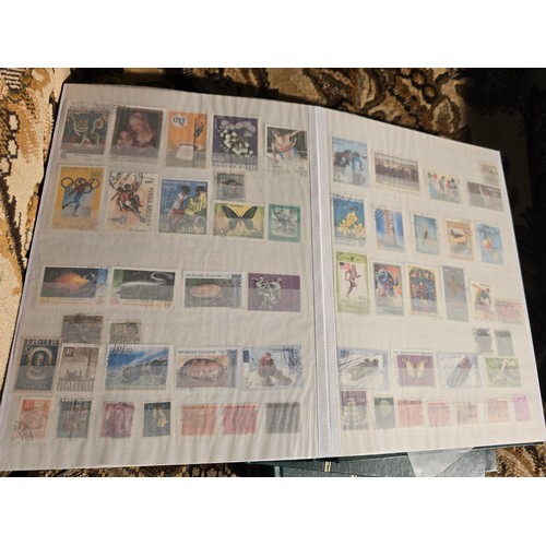 99 - 3x good albums of world stamps - small example of pages shown