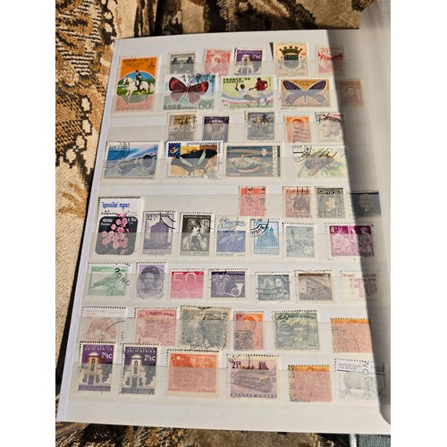 99 - 3x good albums of world stamps - small example of pages shown