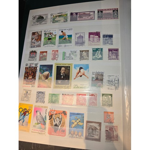 99A - 3x good albums of world stamps - small page example shown