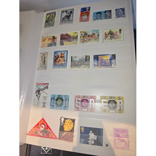 99A - 3x good albums of world stamps - small page example shown