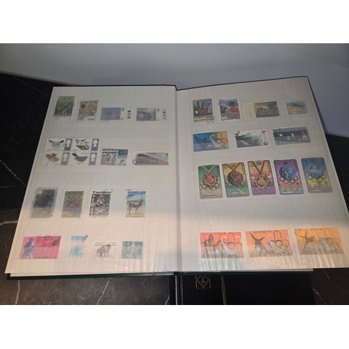 99A - 3x good albums of world stamps - small page example shown