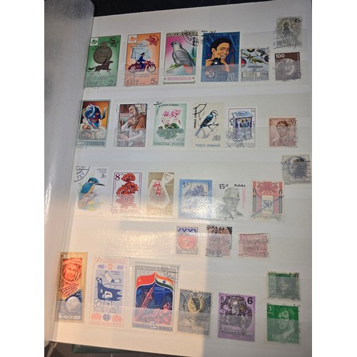 99A - 3x good albums of world stamps - small page example shown