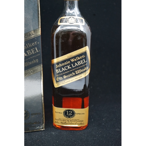 12 - Bottle of Black Label Johnnie Walker Whisky