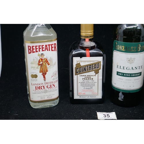 35 - Selection of spirits to include Beefeater Gin, Cointreau, Cherry and Bols Cherry Brandy