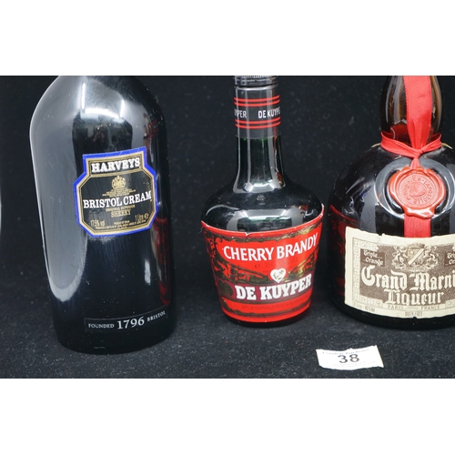 38 - Selection of spirits to include Harvey Bristol Cream, De Kuyper Cherry Brandy, Grand Marnier and Dra... 