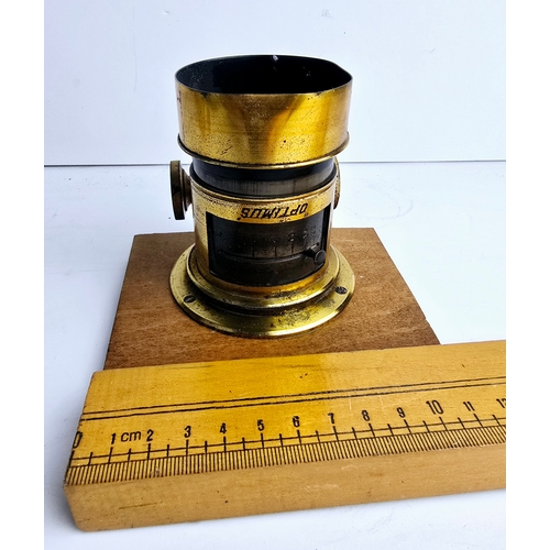 61F - Mounted old brass lens marked Optimus