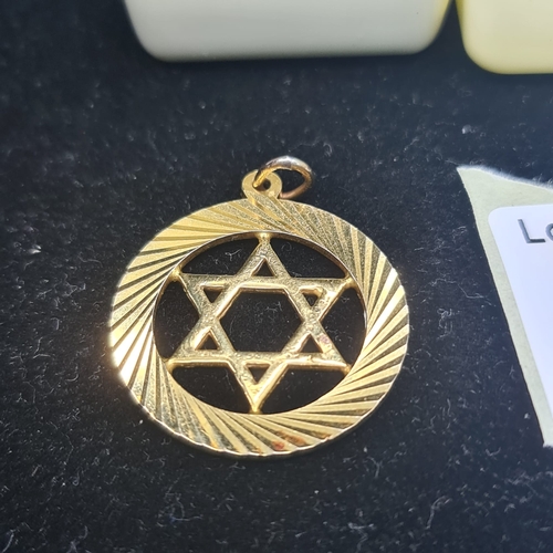 63a - 9ct Gold Star of David Pendant 4.67g