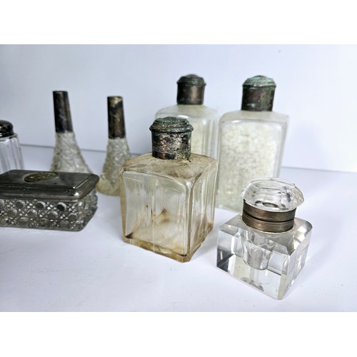 73 - Group of antique and vintage cut glass bottles etc.