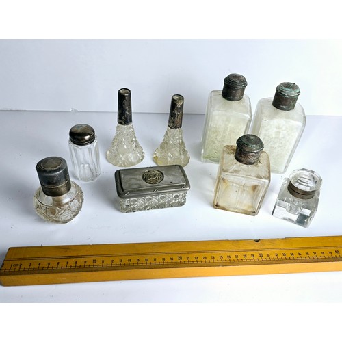 73 - Group of antique and vintage cut glass bottles etc.