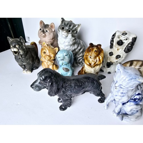 90 - Group of vintage and antique cat and dog ornaments including Royal Doulton, Beswick etc.