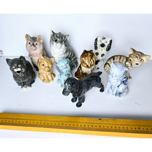 90 - Group of vintage and antique cat and dog ornaments including Royal Doulton, Beswick etc.