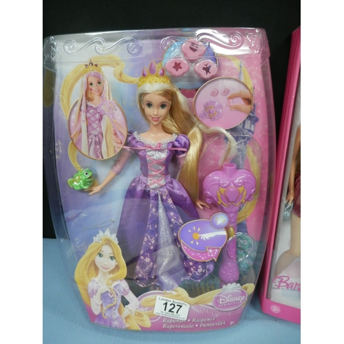 127 - Collection of Disney Rapunzel doll and Barbie Fashion Fever doll with accessories. All new and boxed