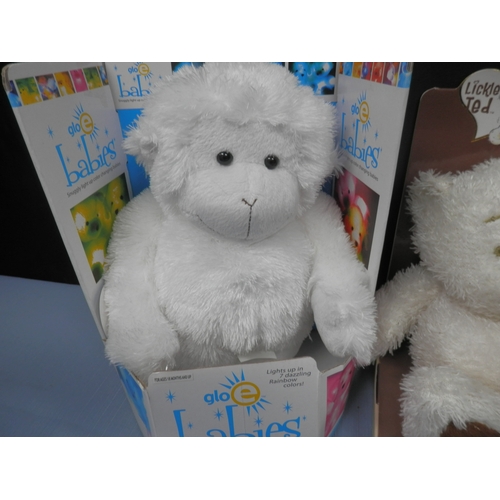 136 - Collection of plush toys including GloE Babies and Lickle Ted. (New & Packaged Vintage Stock)