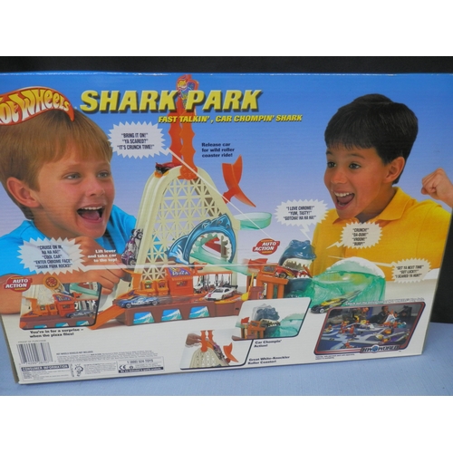 144 - Hot Wheels Shark Park playset with electronic talking shark and roller coaster features, by Mattel. ... 