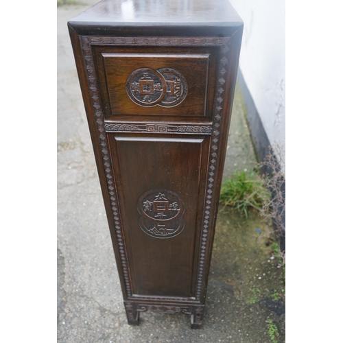 449 - A Chinese ebonised breakfront display cabinet