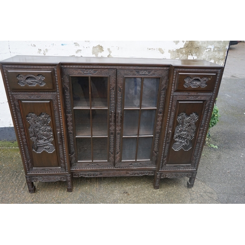 449 - A Chinese ebonised breakfront display cabinet