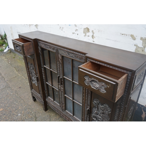 449 - A Chinese ebonised breakfront display cabinet