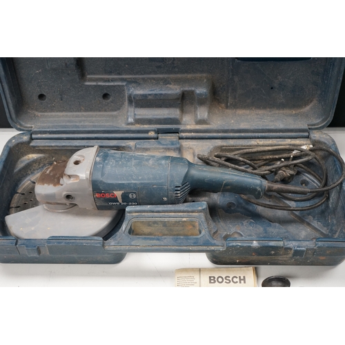 451 - Bosch GWS 20-230 angle grinder with case, manual, and accessories.