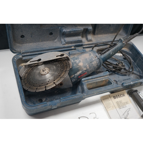 451 - Bosch GWS 20-230 angle grinder with case, manual, and accessories.