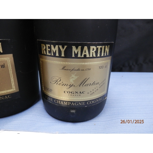 1h - Two Vintage bottles of Rémy Martin Fine Champagne V.S.O.P. Cognac.