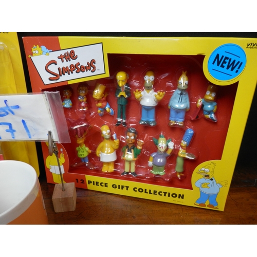 171 - Collection of The Simpsons items to include Figures, The Simpsons Trivia Game and a Mug