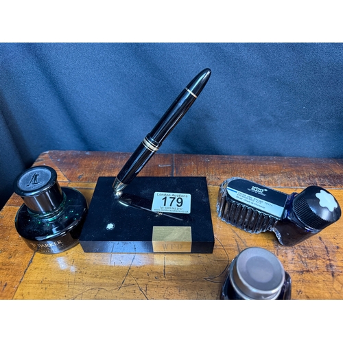 179 - Mont Blanc Miesterstuck Pen Desk Stand with Matching 14 Karat Nib 4810 Fountain Pen alongside a Bott... 