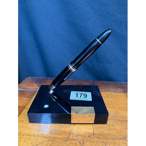 179 - Mont Blanc Miesterstuck Pen Desk Stand with Matching 14 Karat Nib 4810 Fountain Pen alongside a Bott... 