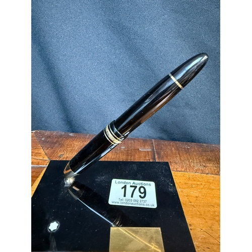 179 - Mont Blanc Miesterstuck Pen Desk Stand with Matching 14 Karat Nib 4810 Fountain Pen alongside a Bott... 