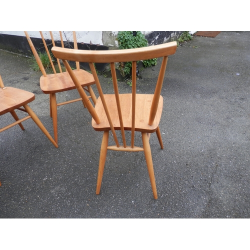 660A - A Set of Mid Century Ercol Stickback Chairs and an Ercol Cowhorn Chair