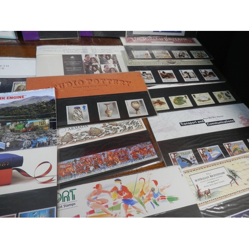 241 - Collection of Commemorative Stamps Most in Sealed Packaging together with some Commemorative Coins