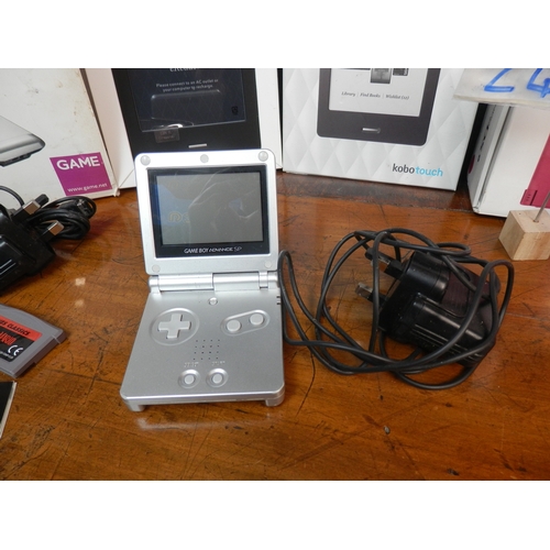 244 - Nintendo DSi Boxed together with another Nintendo DS, a selection of Games, a Game Boy Advance SP an... 