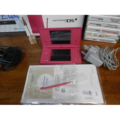 244 - Nintendo DSi Boxed together with another Nintendo DS, a selection of Games, a Game Boy Advance SP an... 