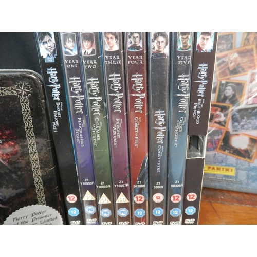 375A - Collection of Harry Potter Collectables to include Harry Potter DVDs & Trading Cards and a First Pri... 