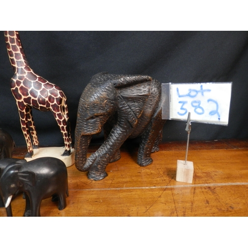 382 - Herd of Hardwood Elephants together with a Wooden Giraffe (7)