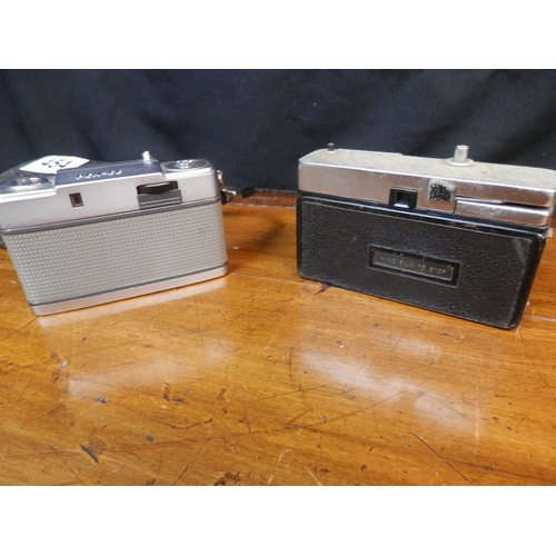 454 - Two Vintage Cameras: Halina Simplette F & Olympus Pen