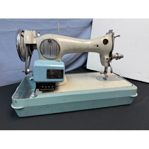 618 - Singer Sewing Machine & A Sew-Tric Sewing Machine