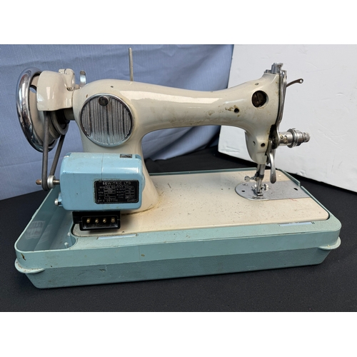 618 - Singer Sewing Machine & A Sew-Tric Sewing Machine