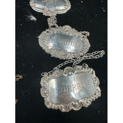 307A - Group of Four Hallmarked Silver Decanter Tags, One Plated Example and an Enamelled Example (6)