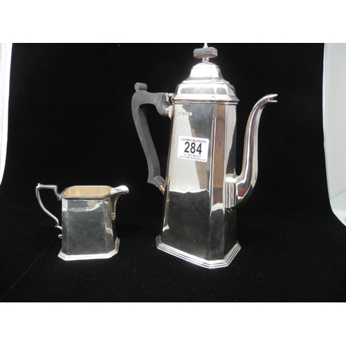 284 - Pair of George VI Silver Harrods Coffee Pots, 25cm Hallmarked Sheffield 1947 with a matching Milk Ju... 